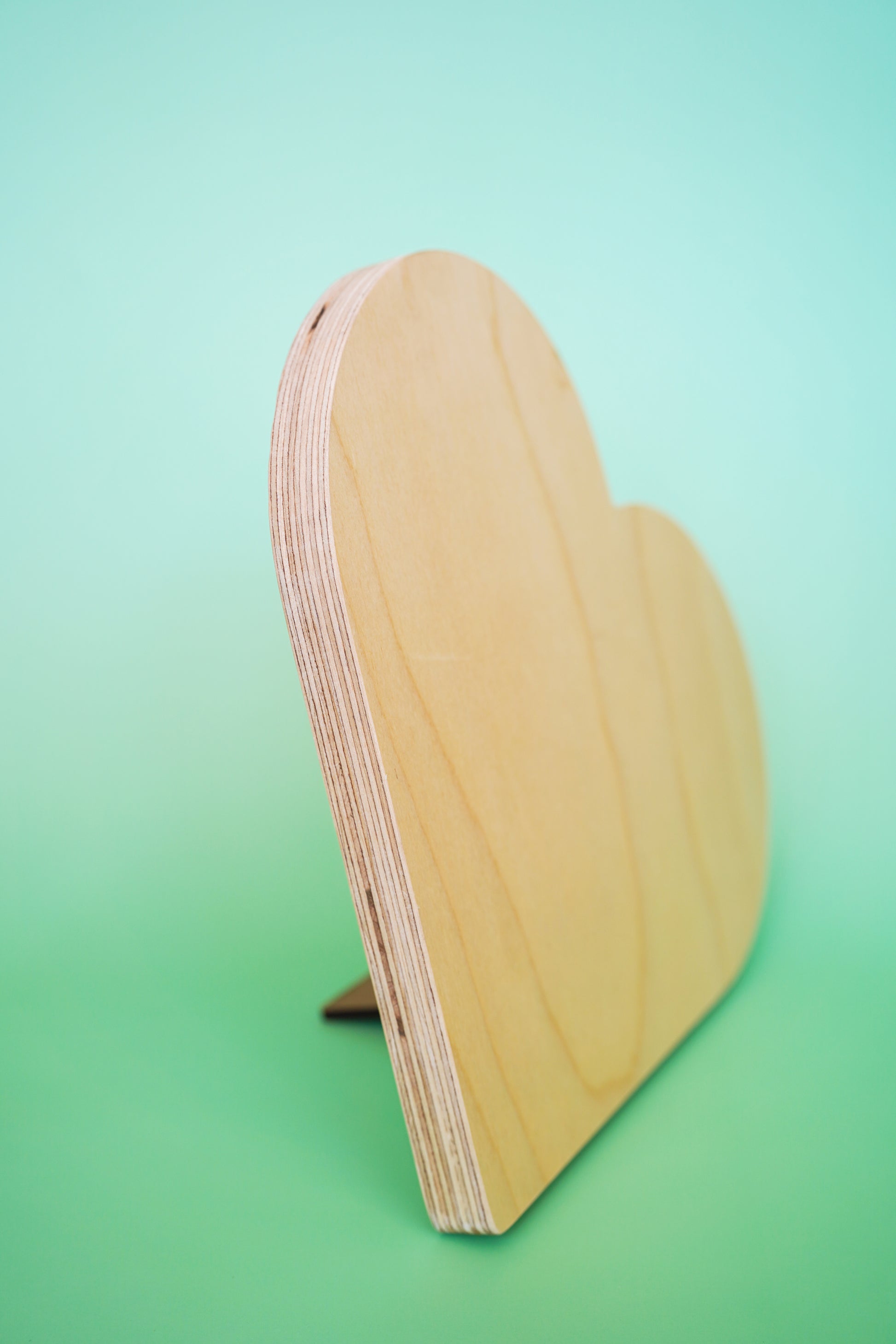 Cornice legno - cuore in compensato
